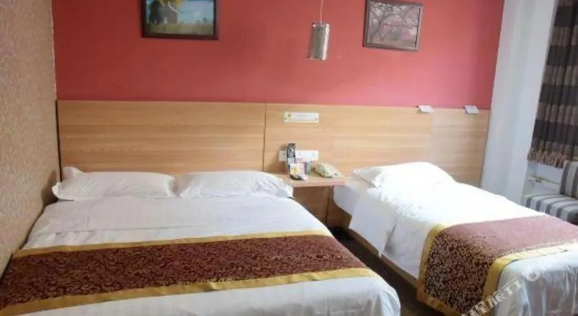 Bed in Super 8 Hotel Beijing South Railway Station Majiabao Metro Station