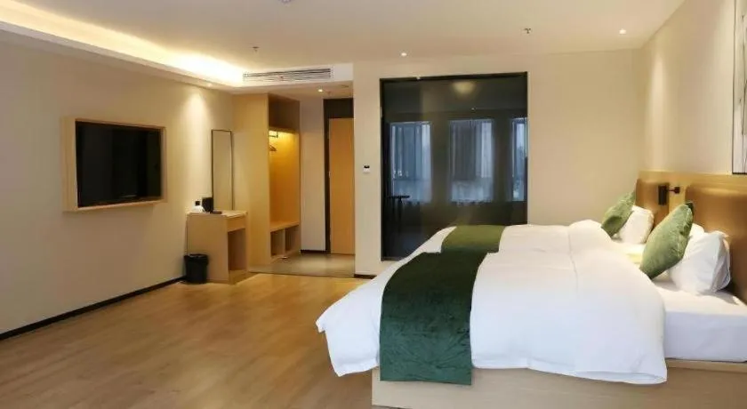 Bed in Green Tree Inn Express Chizhou Gymnasium