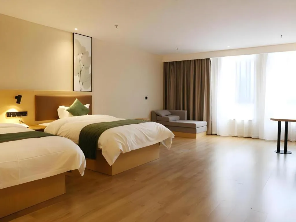 Bed in Green Tree Inn Express Chizhou Gymnasium