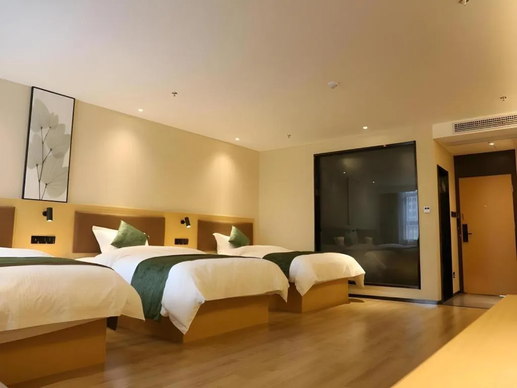 Bed in Green Tree Inn Express Chizhou Gymnasium