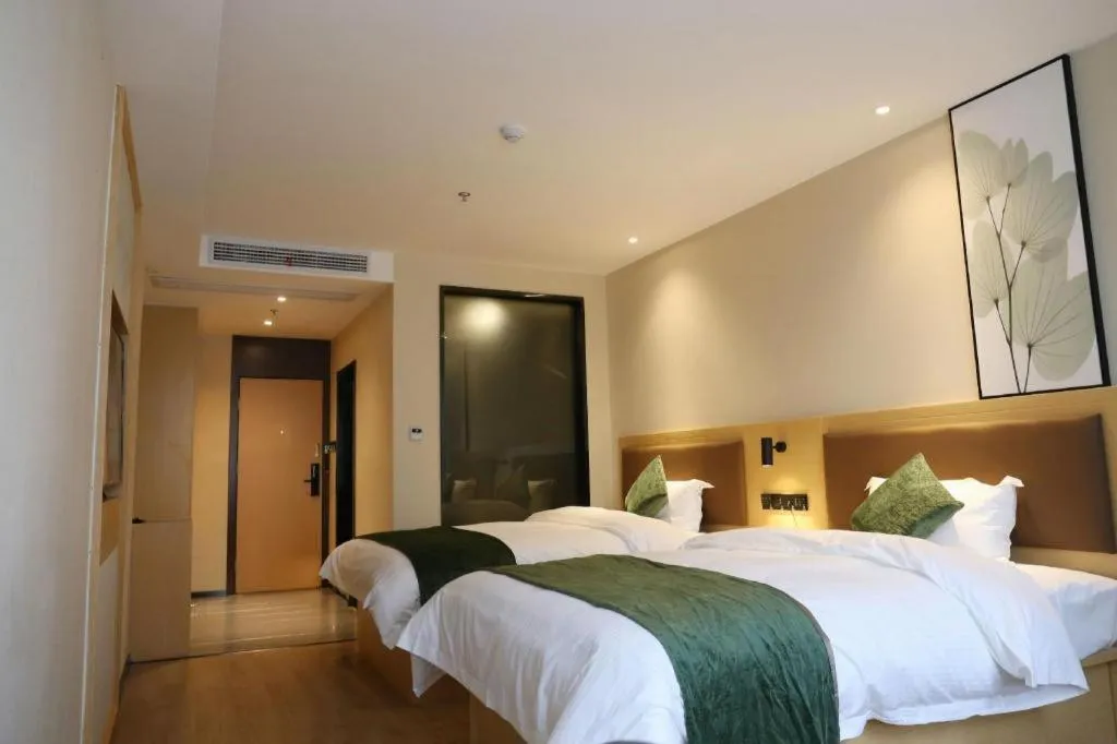 Bed in Green Tree Inn Express Chizhou Gymnasium