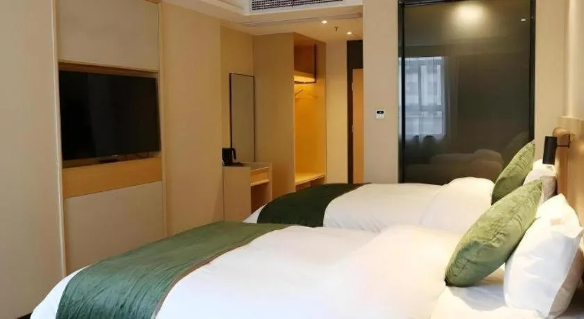 Bed in Green Tree Inn Express Chizhou Gymnasium