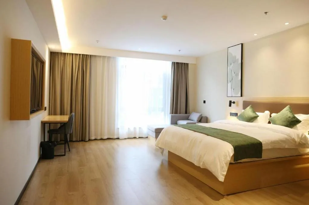 Bed in Green Tree Inn Express Chizhou Gymnasium