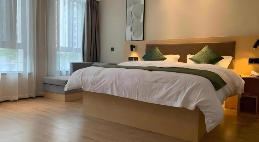 Bed in Green Tree Inn Express Chizhou Gymnasium