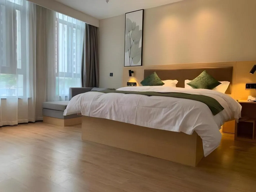 Bed in Green Tree Inn Express Chizhou Gymnasium
