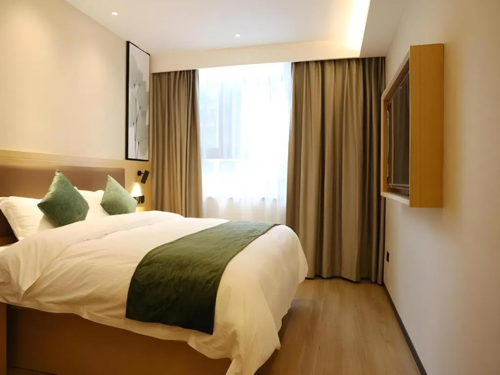 Bed in Green Tree Inn Express Chizhou Gymnasium