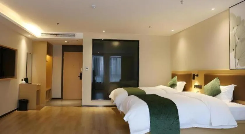 Bed in Green Tree Inn Express Chizhou Gymnasium