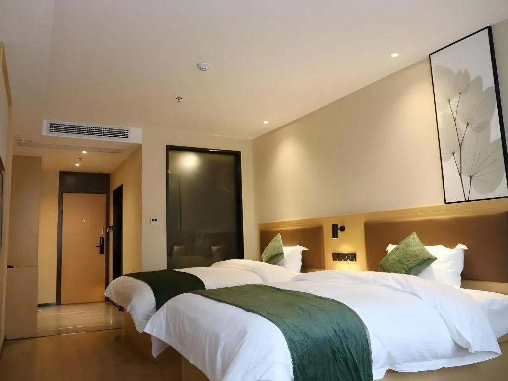Bed in Green Tree Inn Express Chizhou Gymnasium