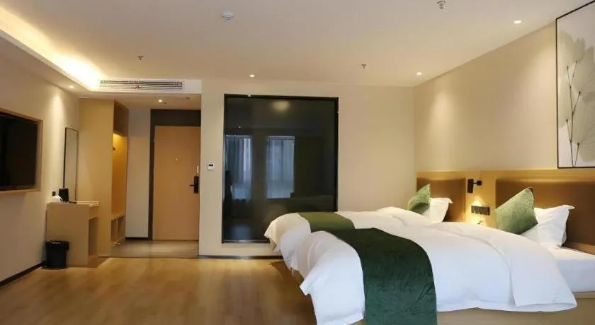 Bed in Green Tree Inn Express Chizhou Gymnasium