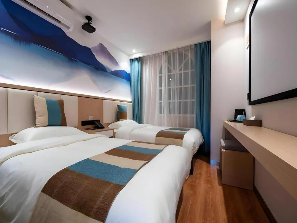 Bed in VX Hotel Beijing Daxing Wufutang Metro Station Zhongke Dianshanggu