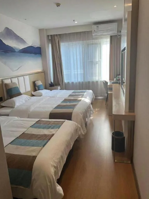 Bed in VX Hotel Beijing Daxing Wufutang Metro Station Zhongke Dianshanggu