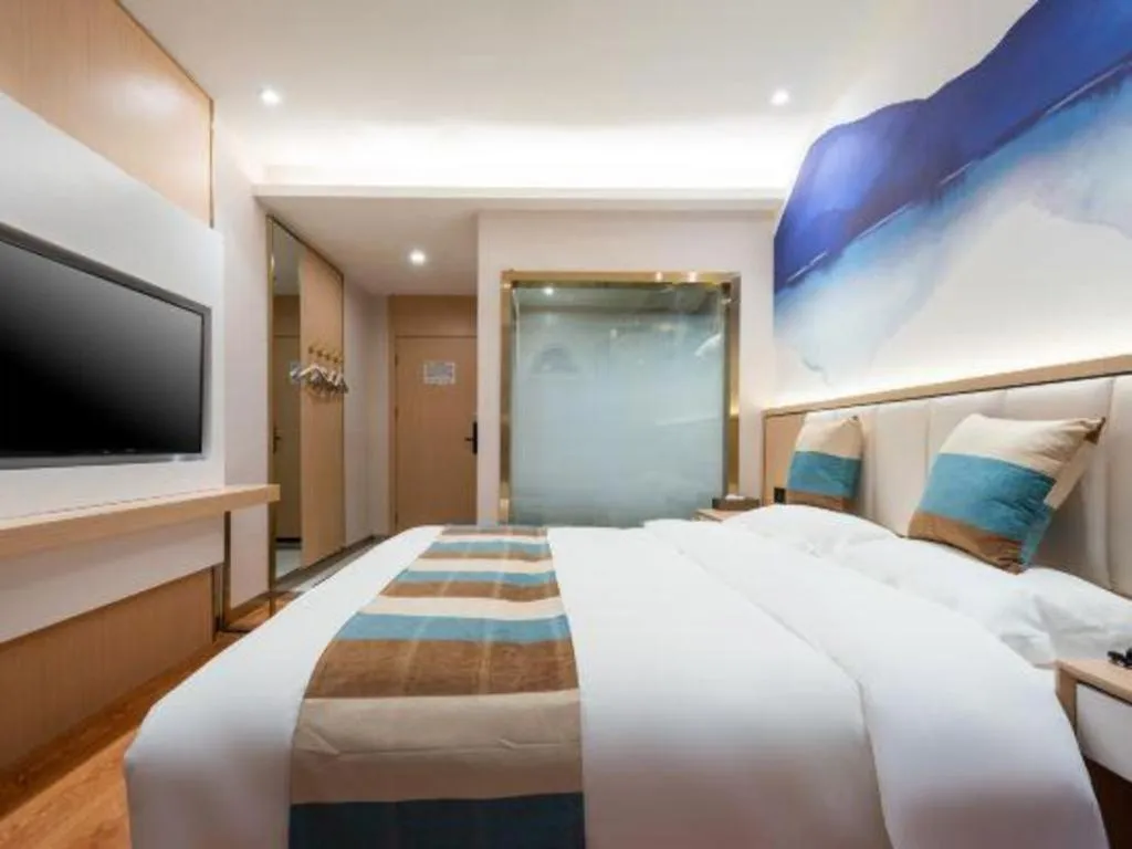 Bed in VX Hotel Beijing Daxing Wufutang Metro Station Zhongke Dianshanggu