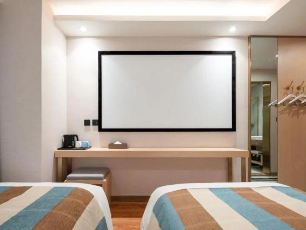 Bed in VX Hotel Beijing Daxing Wufutang Metro Station Zhongke Dianshanggu