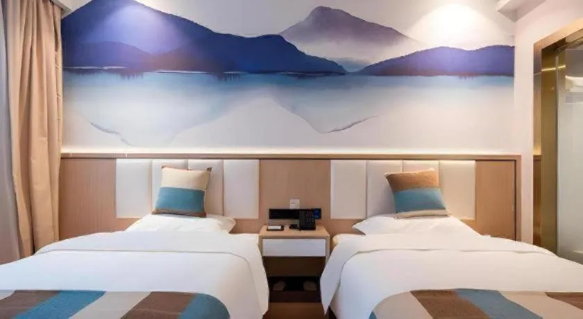 Bed in VX Hotel Beijing Daxing Wufutang Metro Station Zhongke Dianshanggu