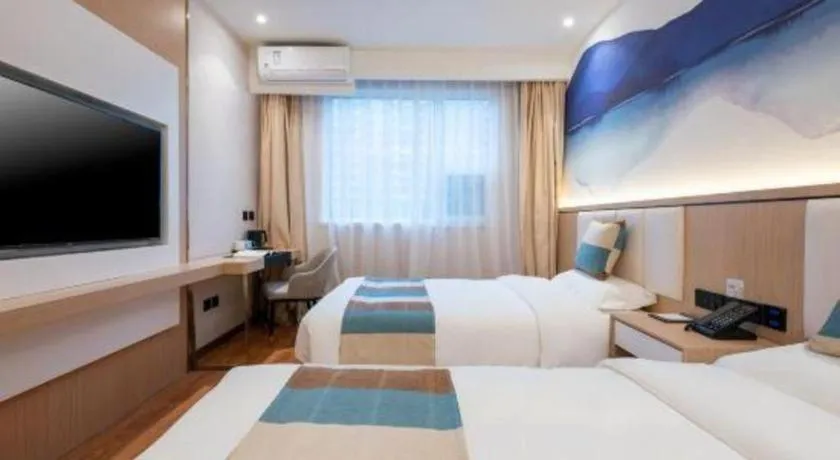 Bed in VX Hotel Beijing Daxing Wufutang Metro Station Zhongke Dianshanggu