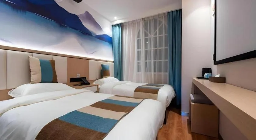 Bed in VX Hotel Beijing Daxing Wufutang Metro Station Zhongke Dianshanggu