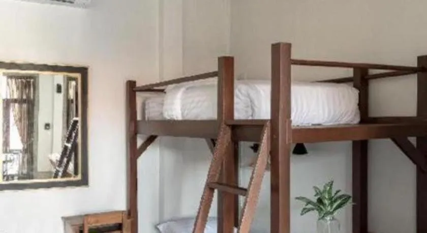 Bed in Uthai Heritage Hotel