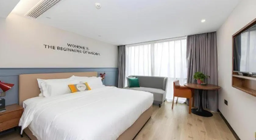 Bed in Premier City Comfort Hotel Yangzhou Shouxi Lake West Gate Weiyang Road Siji Garden