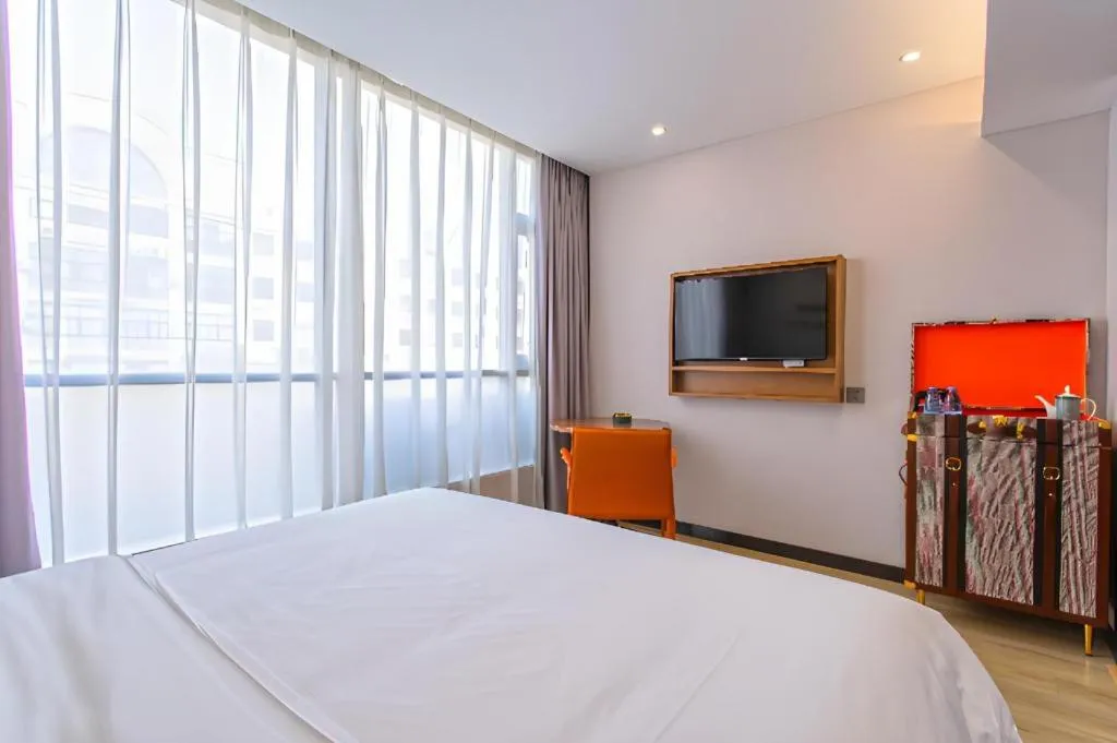 Bed in Premier City Comfort Hotel Yangzhou Shouxi Lake West Gate Weiyang Road Siji Garden