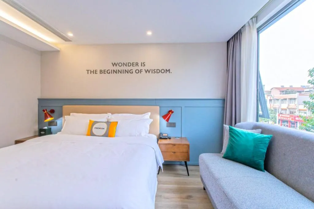 Bed in Premier City Comfort Hotel Yangzhou Shouxi Lake West Gate Weiyang Road Siji Garden