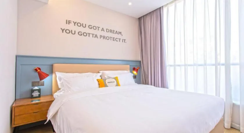 Bed in Premier City Comfort Hotel Yangzhou Shouxi Lake West Gate Weiyang Road Siji Garden