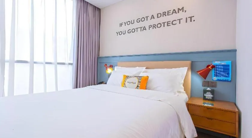 Bed in Premier City Comfort Hotel Yangzhou Shouxi Lake West Gate Weiyang Road Siji Garden