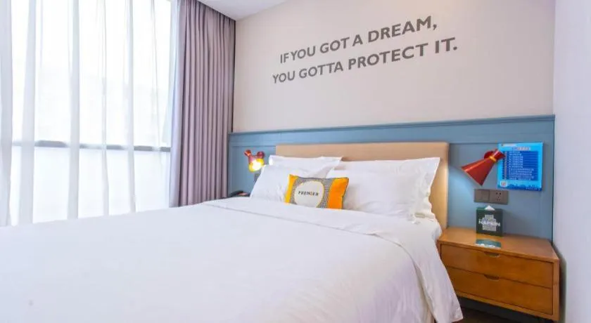 Bed in Premier City Comfort Hotel Yangzhou Shouxi Lake West Gate Weiyang Road Siji Garden