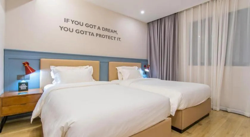 Bed in Premier City Comfort Hotel Yangzhou Shouxi Lake West Gate Weiyang Road Siji Garden