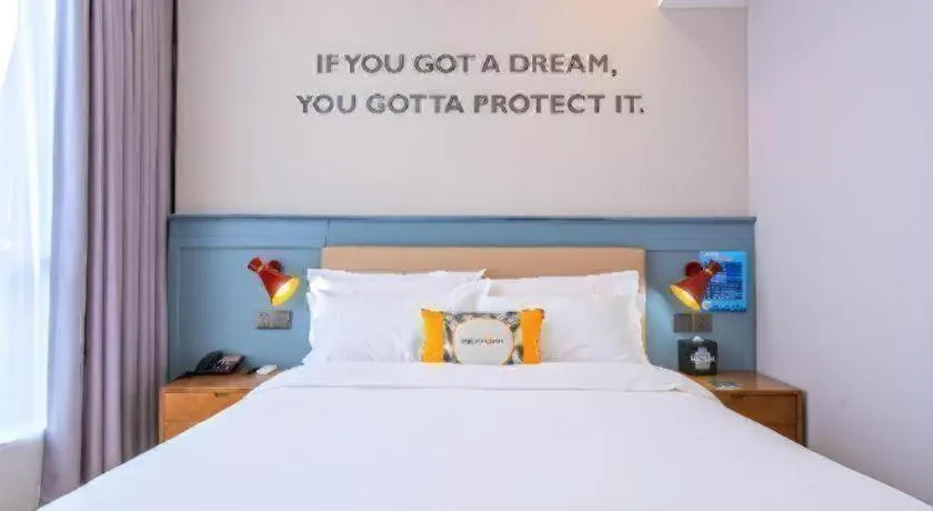 Bed in Premier City Comfort Hotel Yangzhou Shouxi Lake West Gate Weiyang Road Siji Garden