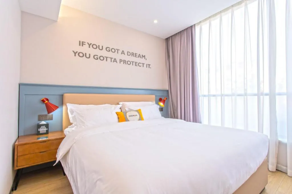 Bed in Premier City Comfort Hotel Yangzhou Shouxi Lake West Gate Weiyang Road Siji Garden