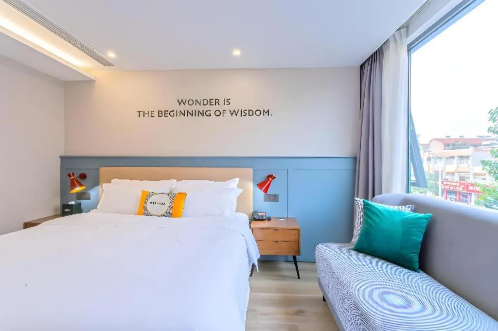 Bed in Premier City Comfort Hotel Yangzhou Shouxi Lake West Gate Weiyang Road Siji Garden