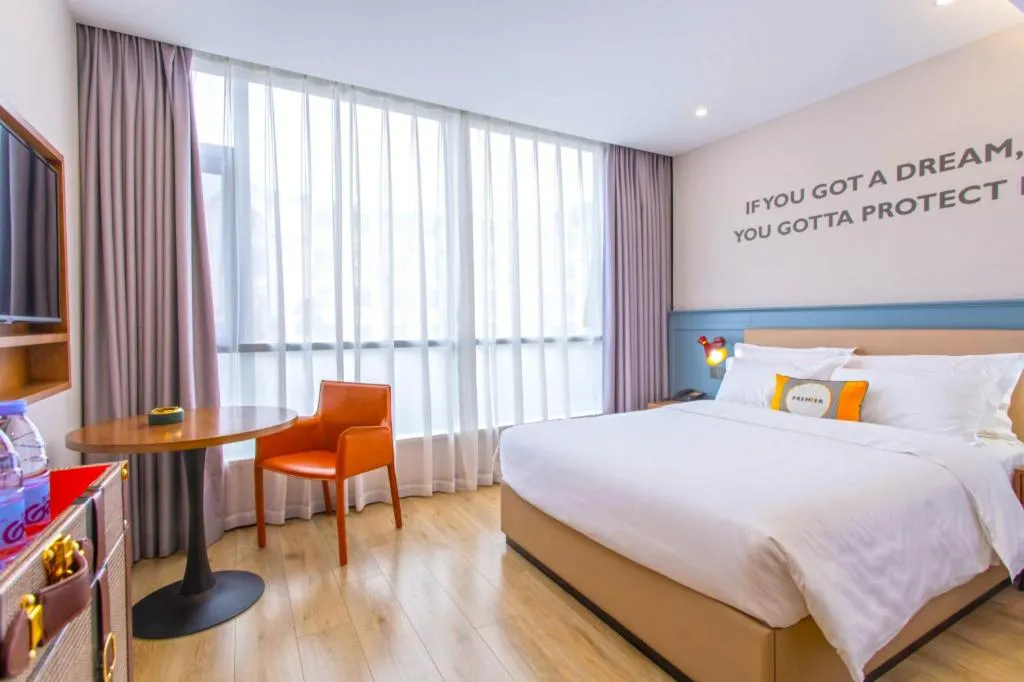 Bed in Premier City Comfort Hotel Yangzhou Shouxi Lake West Gate Weiyang Road Siji Garden