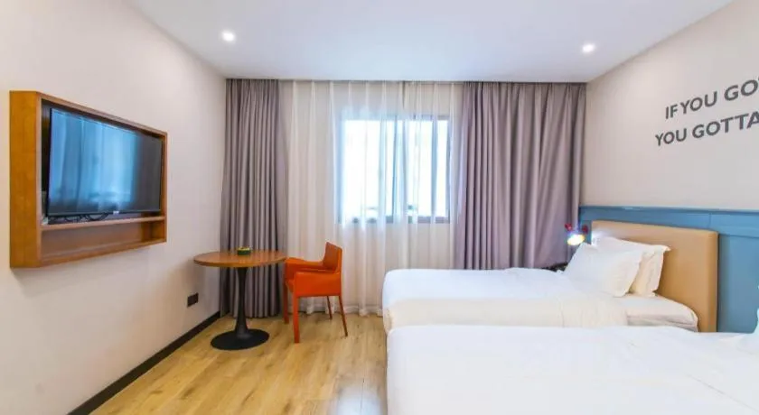 Bed in Premier City Comfort Hotel Yangzhou Shouxi Lake West Gate Weiyang Road Siji Garden