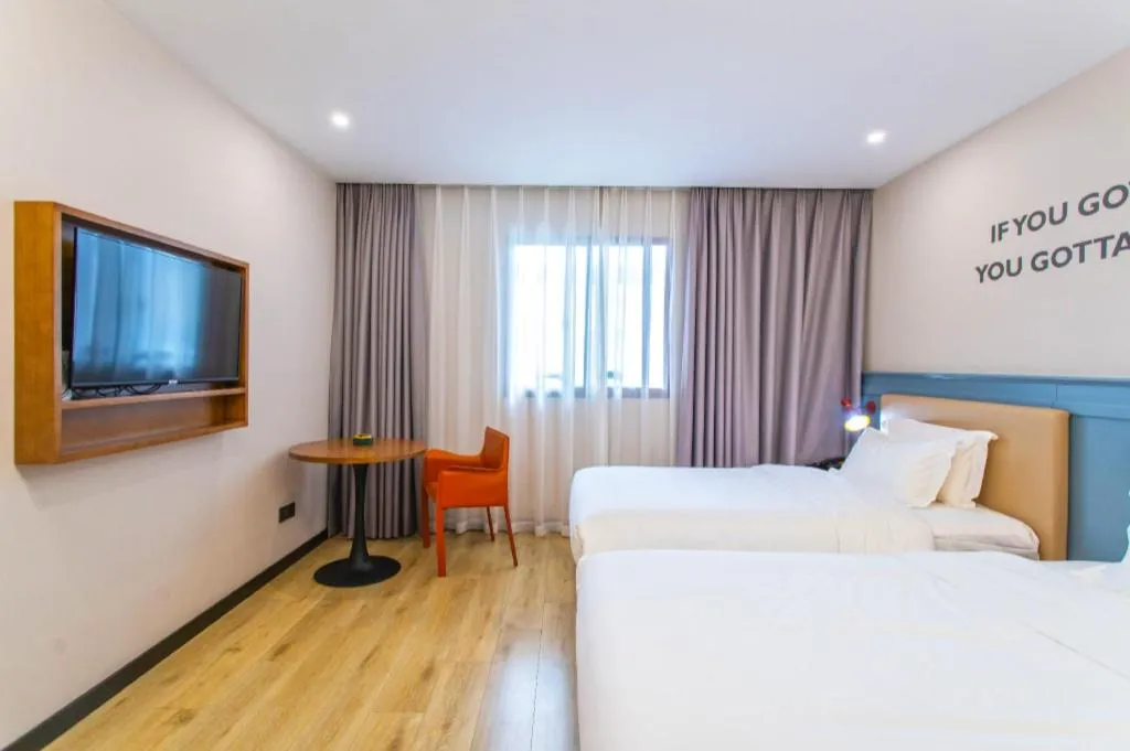 Bed in Premier City Comfort Hotel Yangzhou Shouxi Lake West Gate Weiyang Road Siji Garden