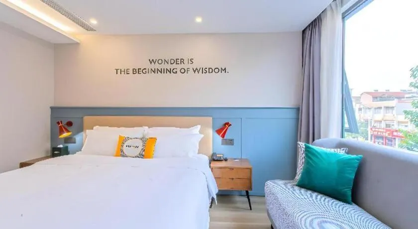 Bed in Premier City Comfort Hotel Yangzhou Shouxi Lake West Gate Weiyang Road Siji Garden