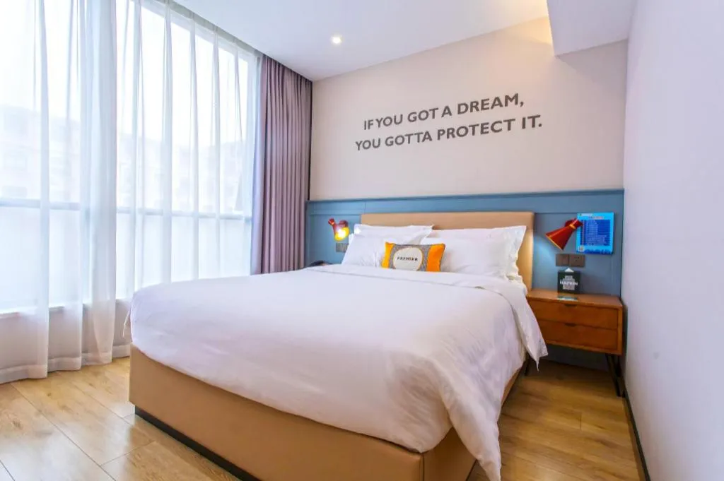 Bed in Premier City Comfort Hotel Yangzhou Shouxi Lake West Gate Weiyang Road Siji Garden