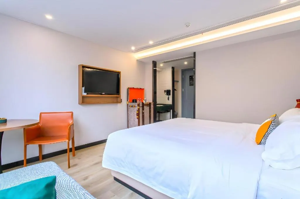 Bed in Premier City Comfort Hotel Yangzhou Shouxi Lake West Gate Weiyang Road Siji Garden