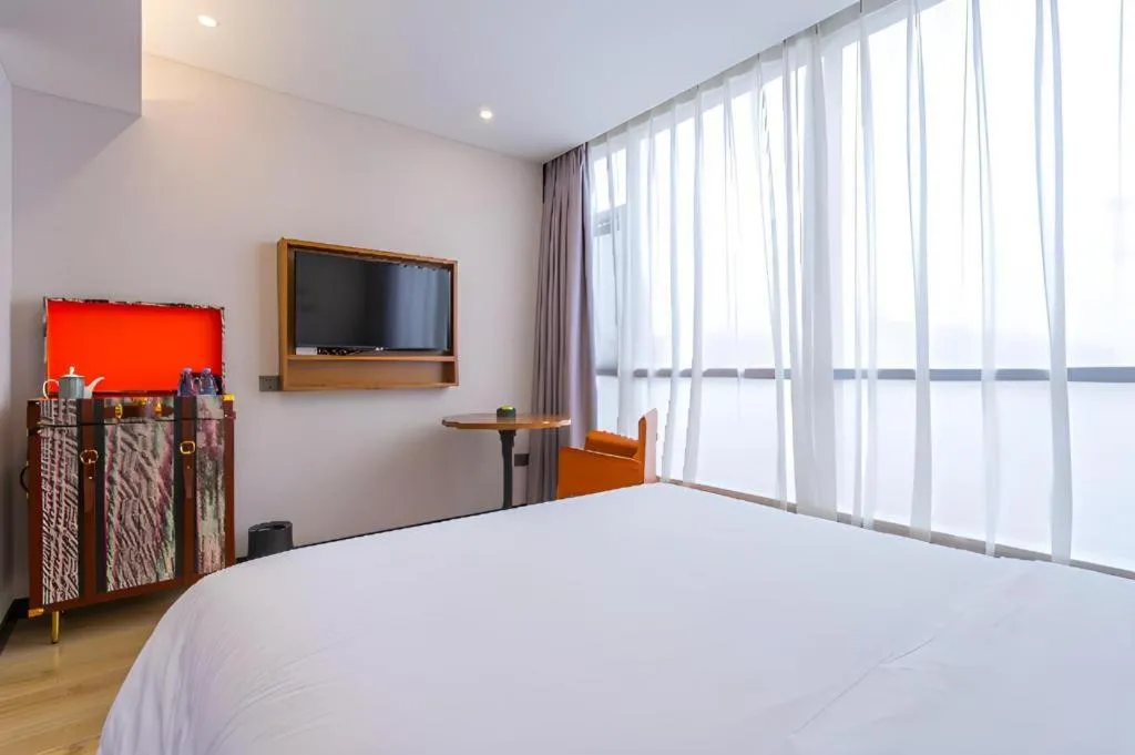 Bed in Premier City Comfort Hotel Yangzhou Shouxi Lake West Gate Weiyang Road Siji Garden