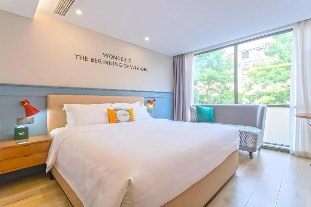 Bed in Premier City Comfort Hotel Yangzhou Shouxi Lake West Gate Weiyang Road Siji Garden