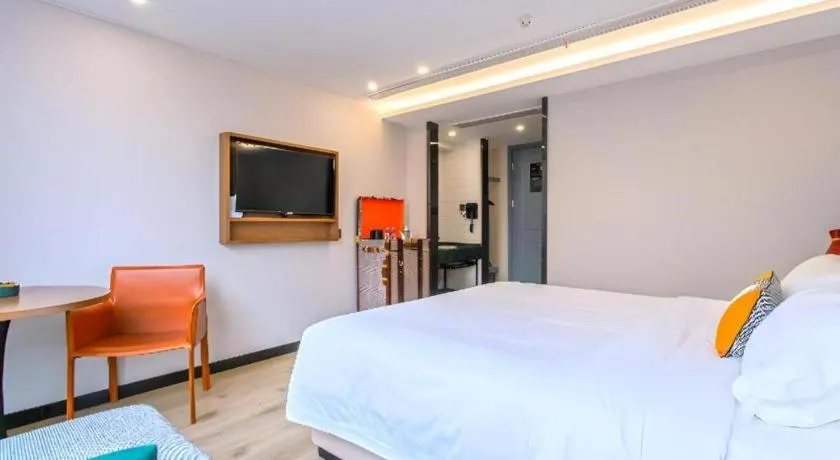 Bed in Premier City Comfort Hotel Yangzhou Shouxi Lake West Gate Weiyang Road Siji Garden