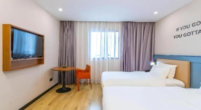 Bed in Premier City Comfort Hotel Yangzhou Shouxi Lake West Gate Weiyang Road Siji Garden