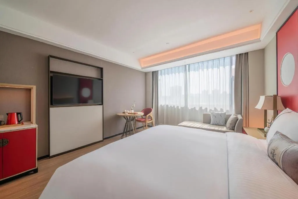 Bed in Echeng Hotel Hezhou Shizheng Square