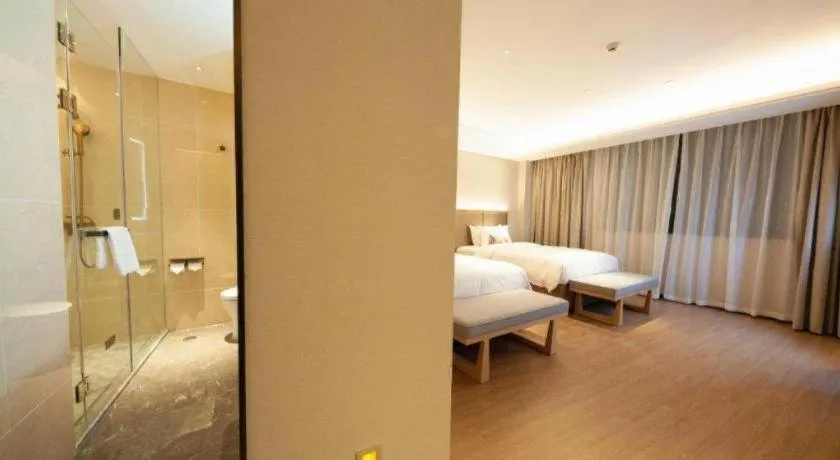 Bed in Echeng Hotel Hezhou Shizheng Square