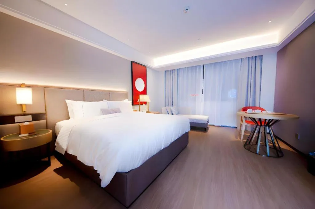 Bed in Echeng Hotel Hezhou Shizheng Square