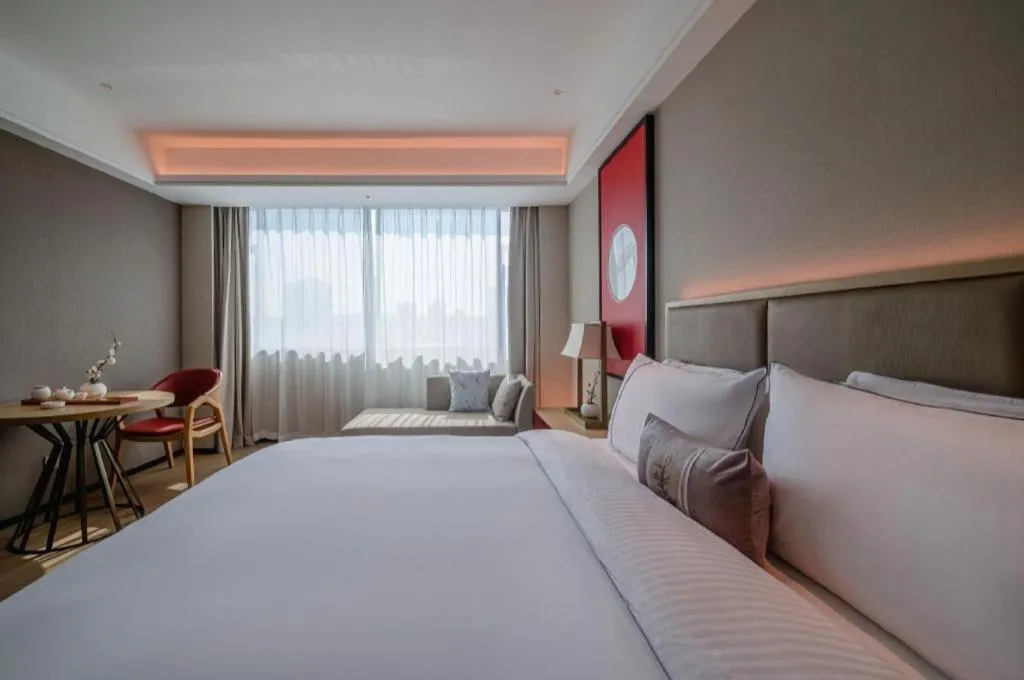 Bed in Echeng Hotel Hezhou Shizheng Square