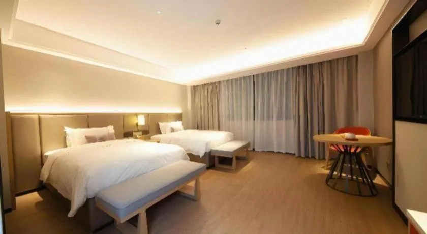 Bed in Echeng Hotel Hezhou Shizheng Square