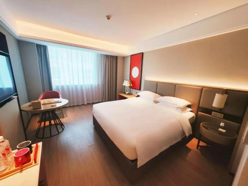 Bed in Echeng Hotel Hezhou Shizheng Square