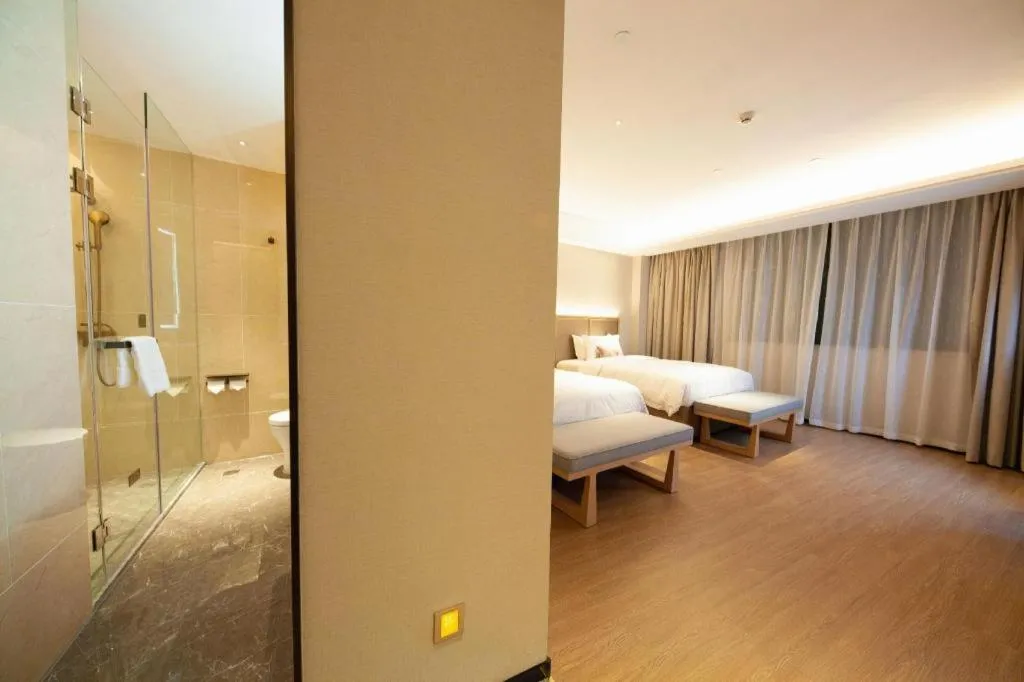 Bed in Echeng Hotel Hezhou Shizheng Square