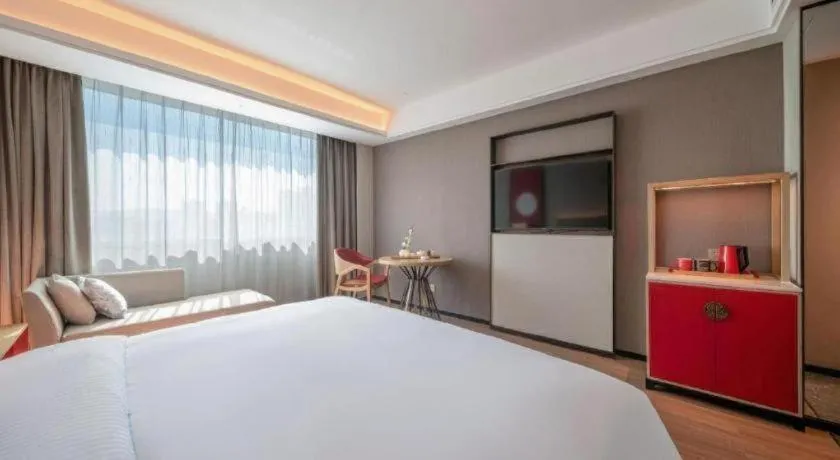 Bed in Echeng Hotel Hezhou Shizheng Square