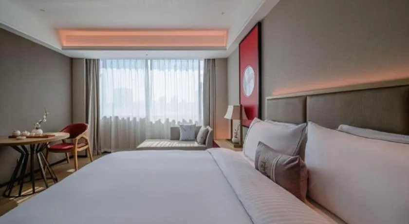Bed in Echeng Hotel Hezhou Shizheng Square